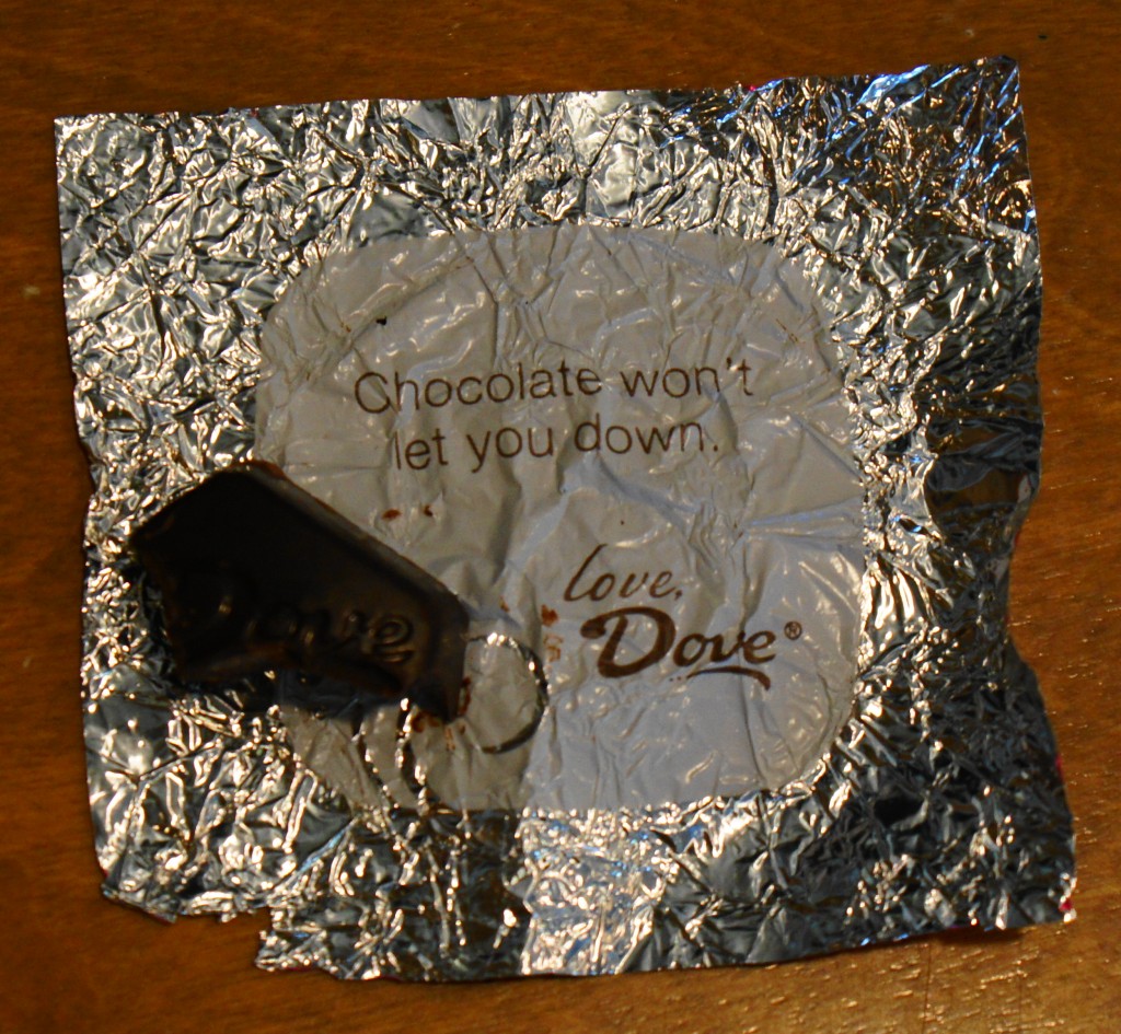 Dove chocolate wrapper message "Chocolate won't let you down"
